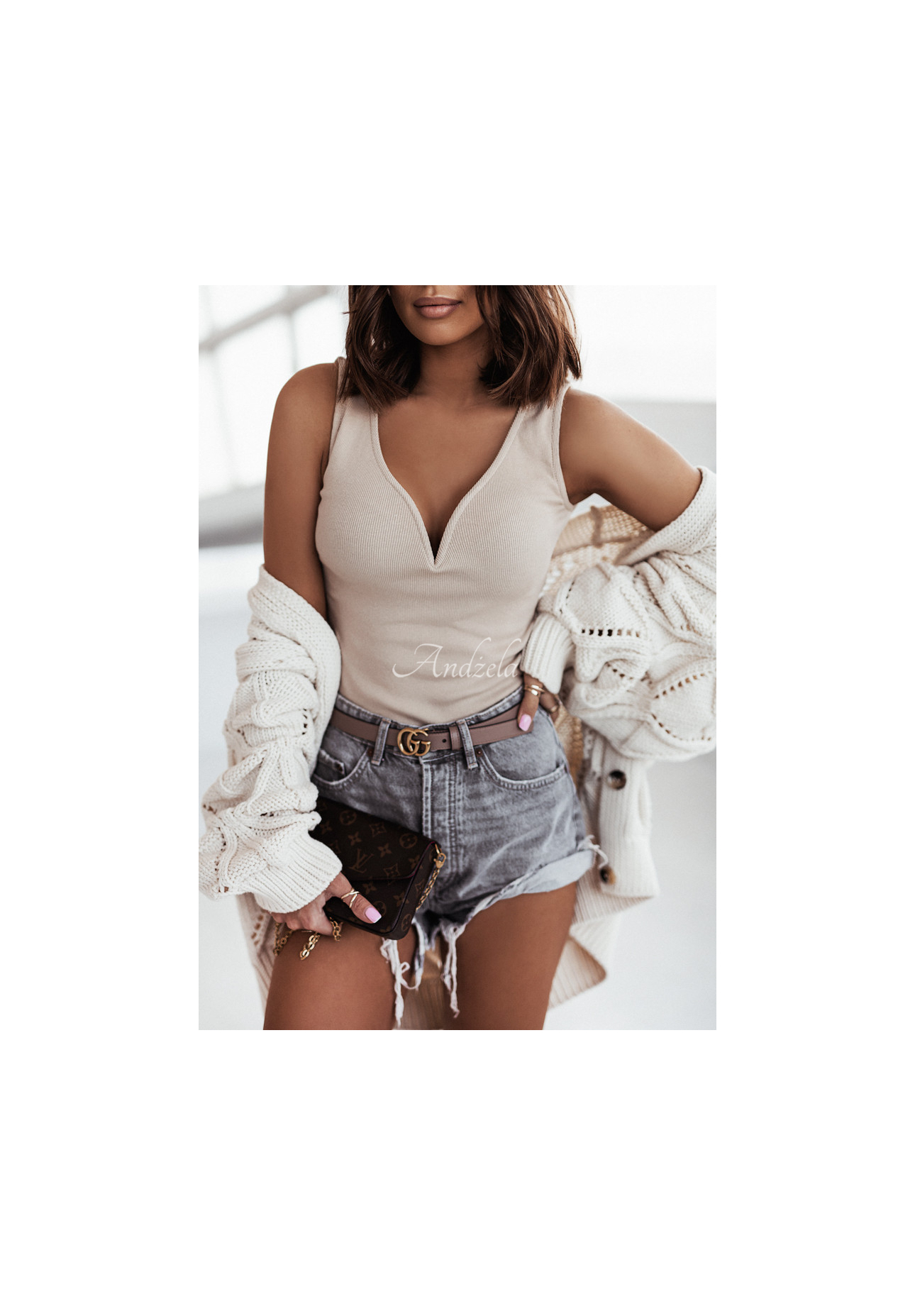 Bluză cu striații și decolteu Amaro