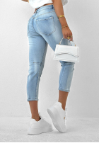 Pantaloni din denim z nadrukiem Dusky Petals albastre