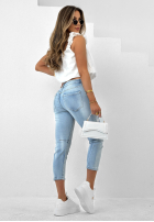 Pantaloni din denim z nadrukiem Dusky Petals albastre