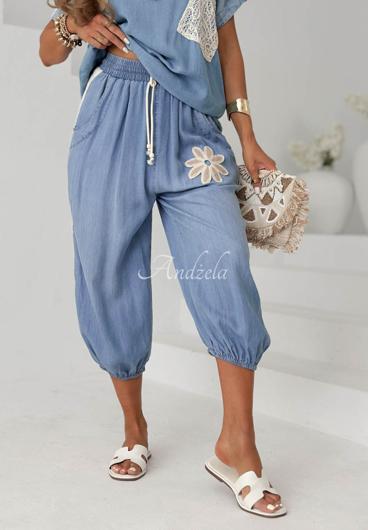 Pantaloni jogger din lyocell cu aplicație Sunset Palm